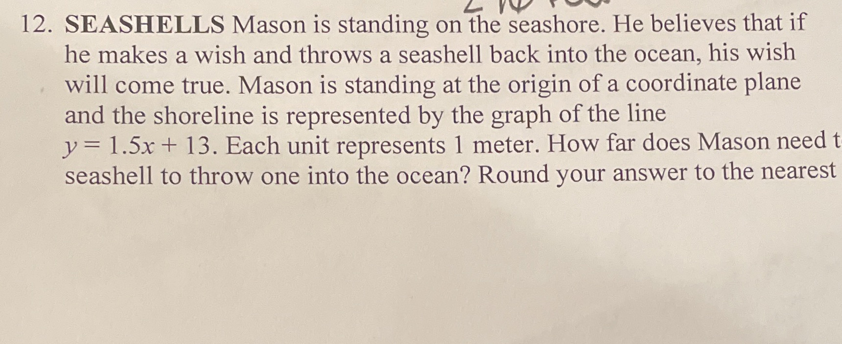 12. SEASHELLS Mason is standing on the seashore.