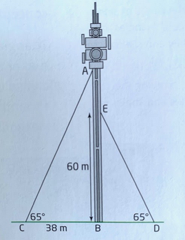 A vertical communications tower is supported by