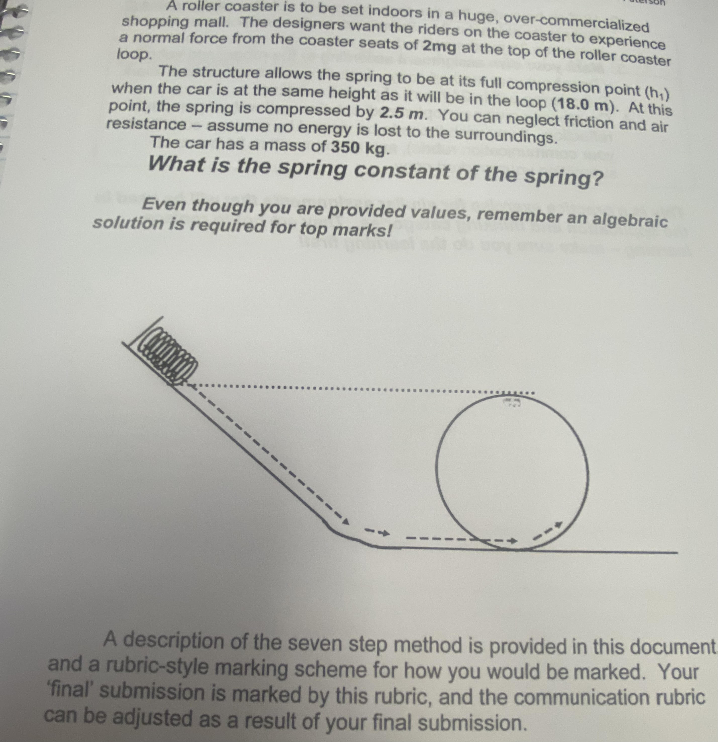 A roller coaster is to be set indoors in a huge,