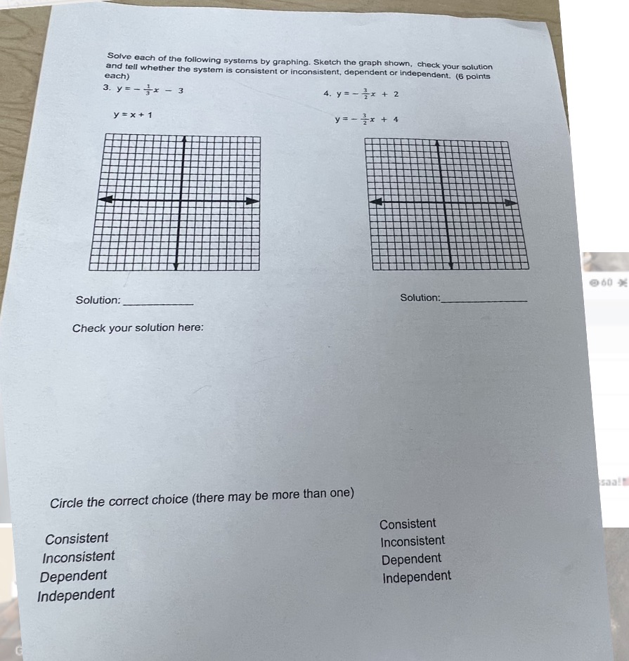 Solve each of the following systems by graphing.