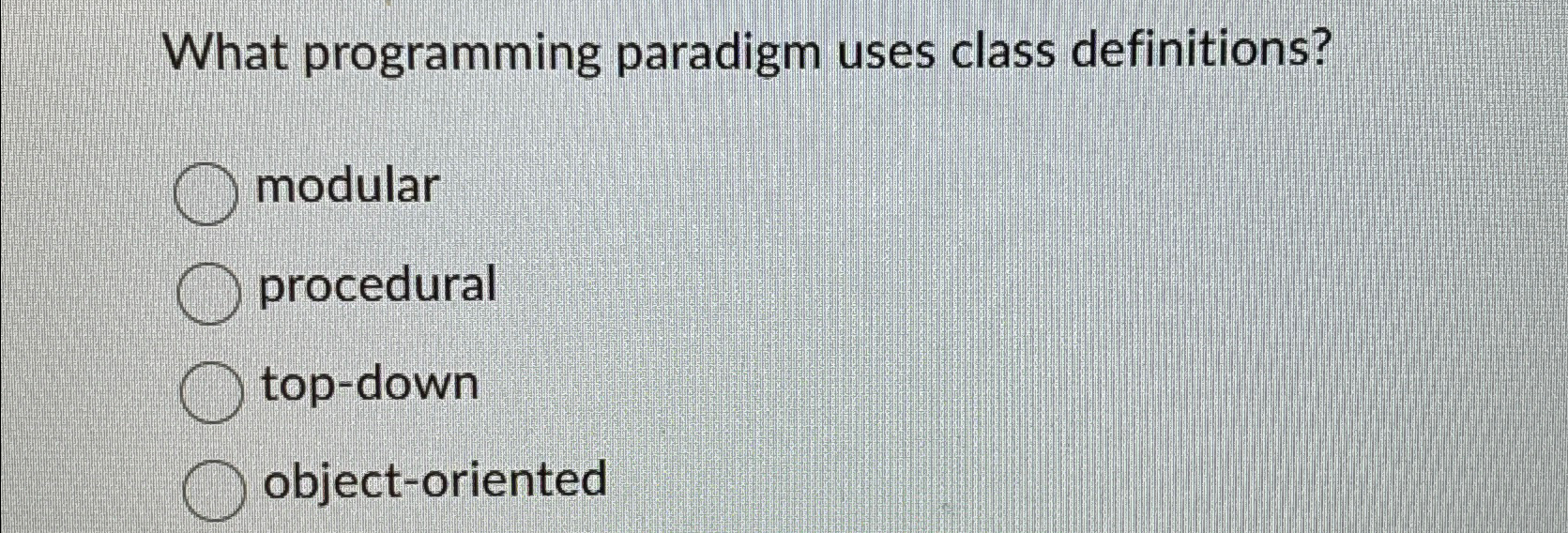 What programming paradigm uses class definitions?