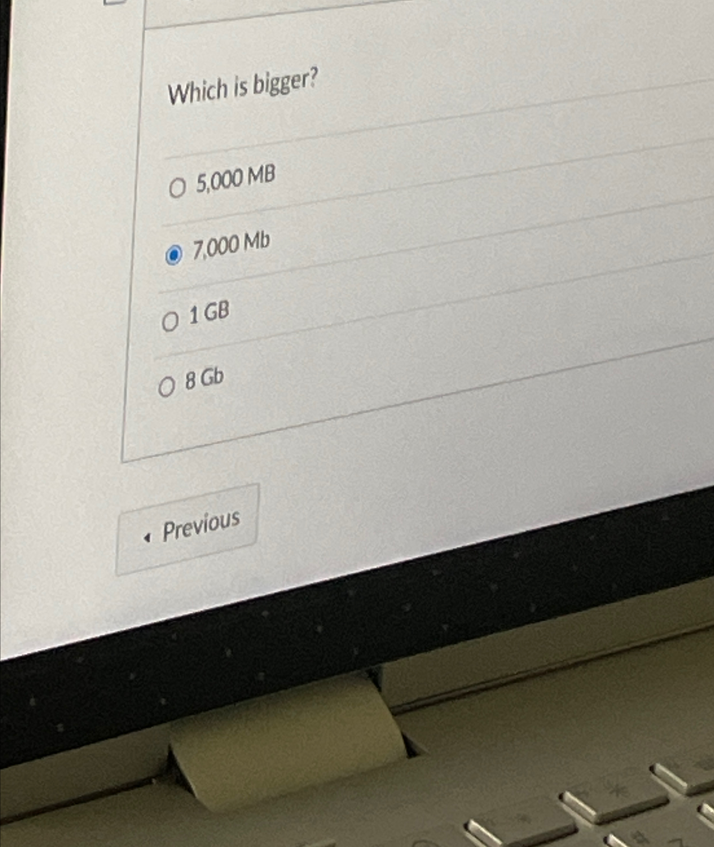 Which is bigger? 5 , 0 0 0 MB 7 , 0 0 0 M b 1 GB