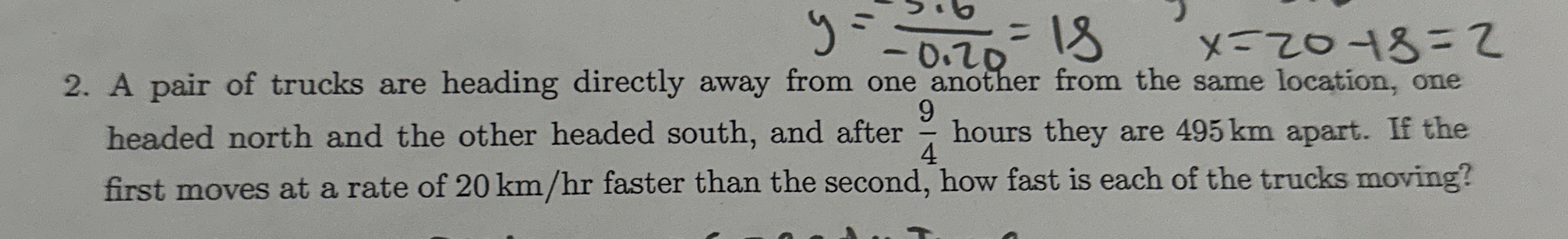 A pair of trucks are heading directly away from
