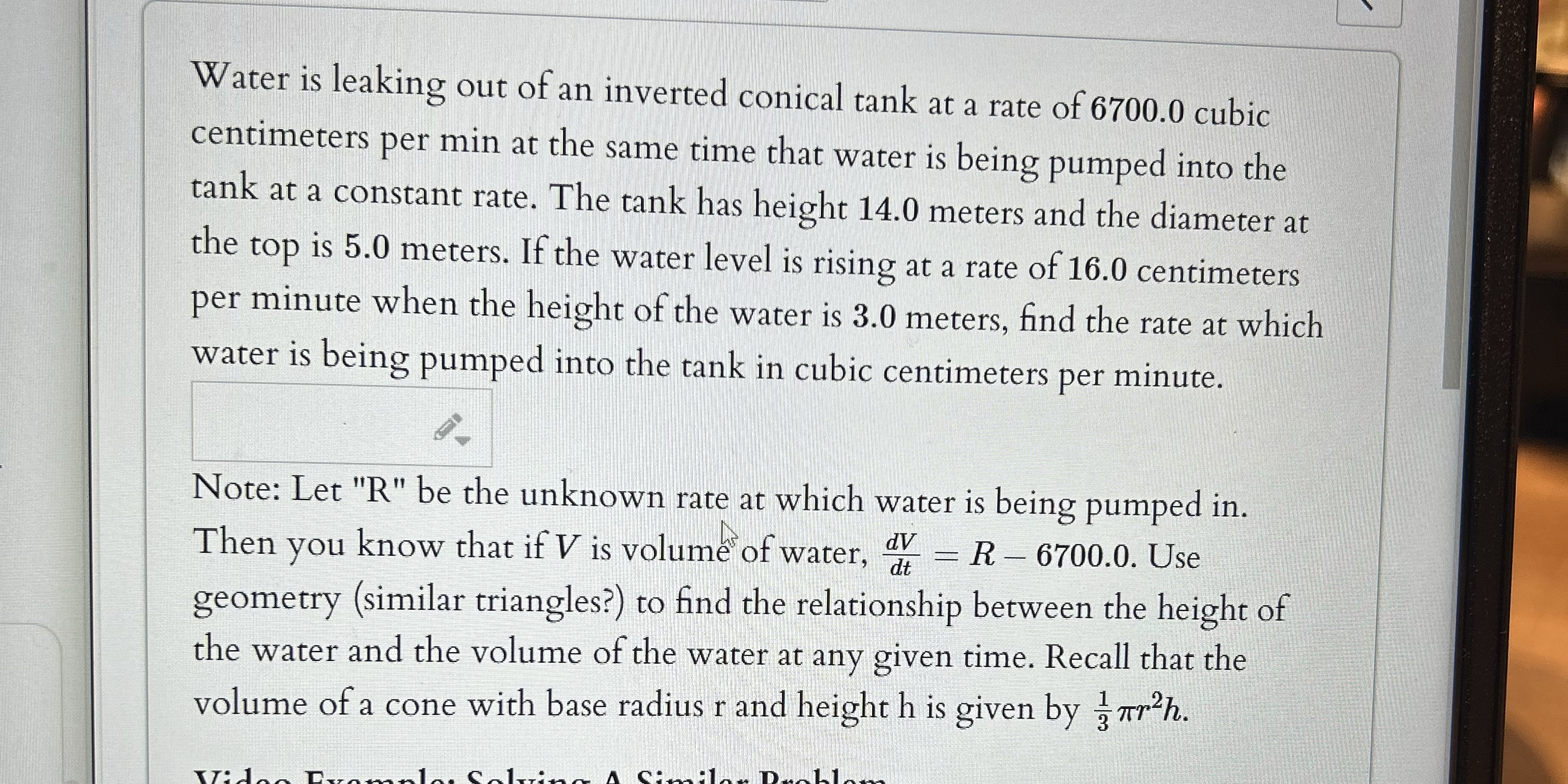 Water is leaking out of an inverted conical tank