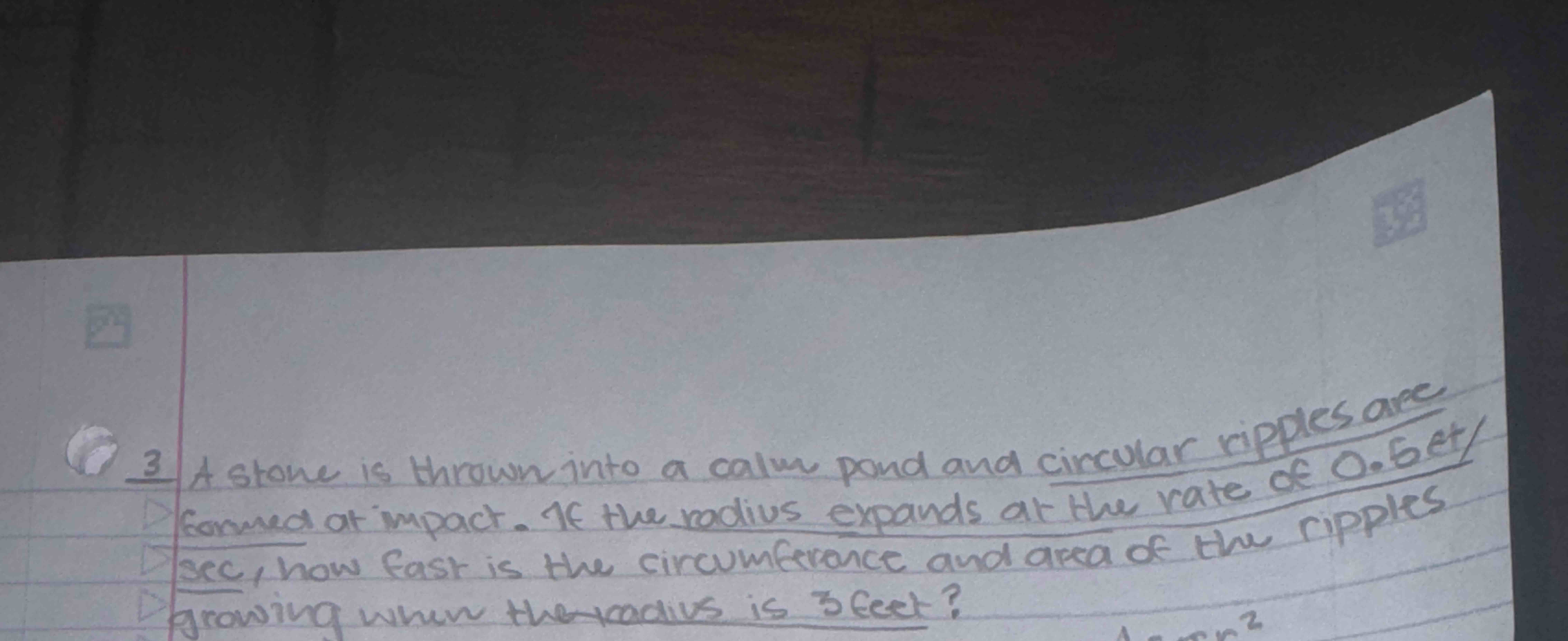 3 A stone is thrown into a calum pond and