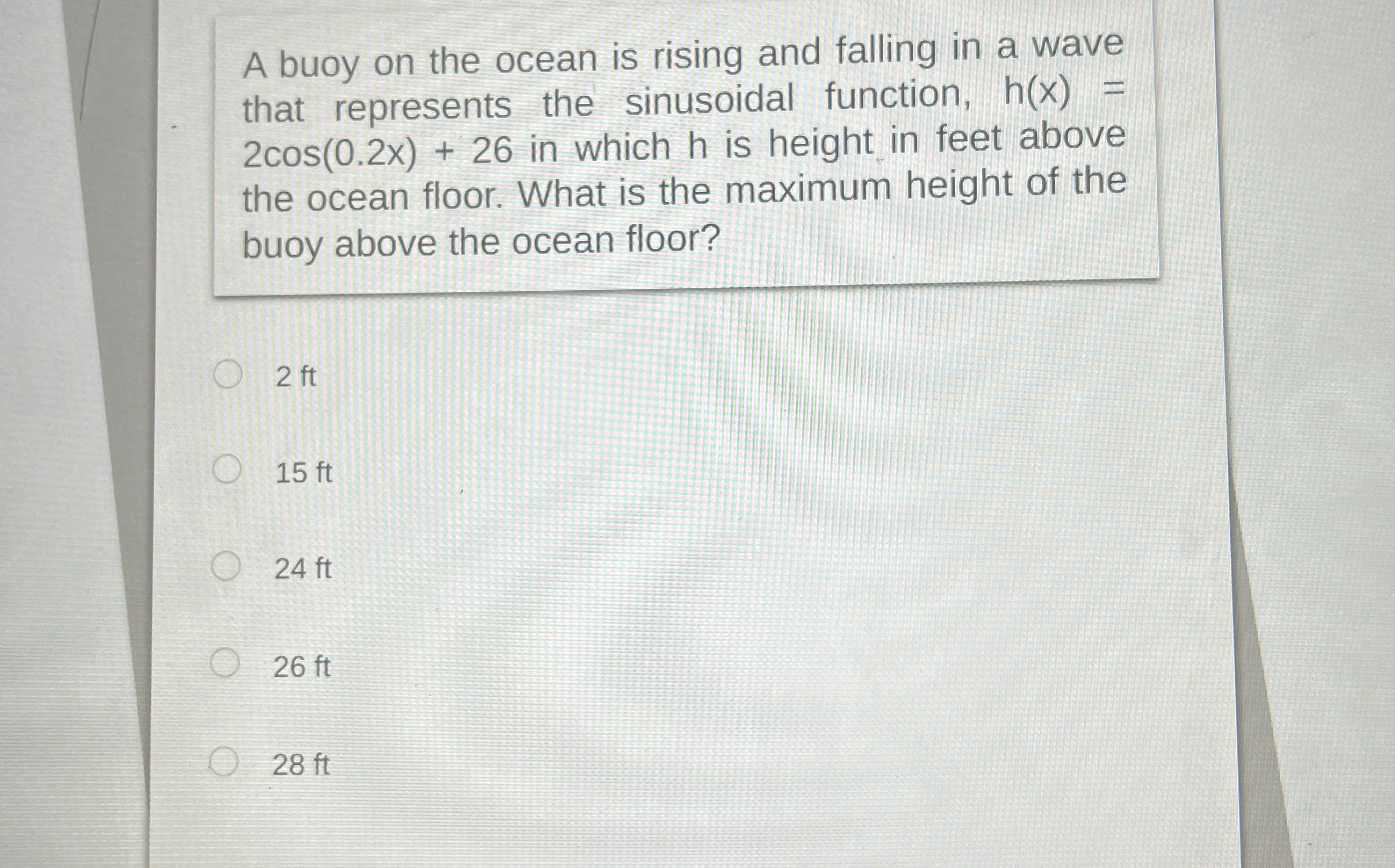 A buoy on the ocean is rising and falling in a