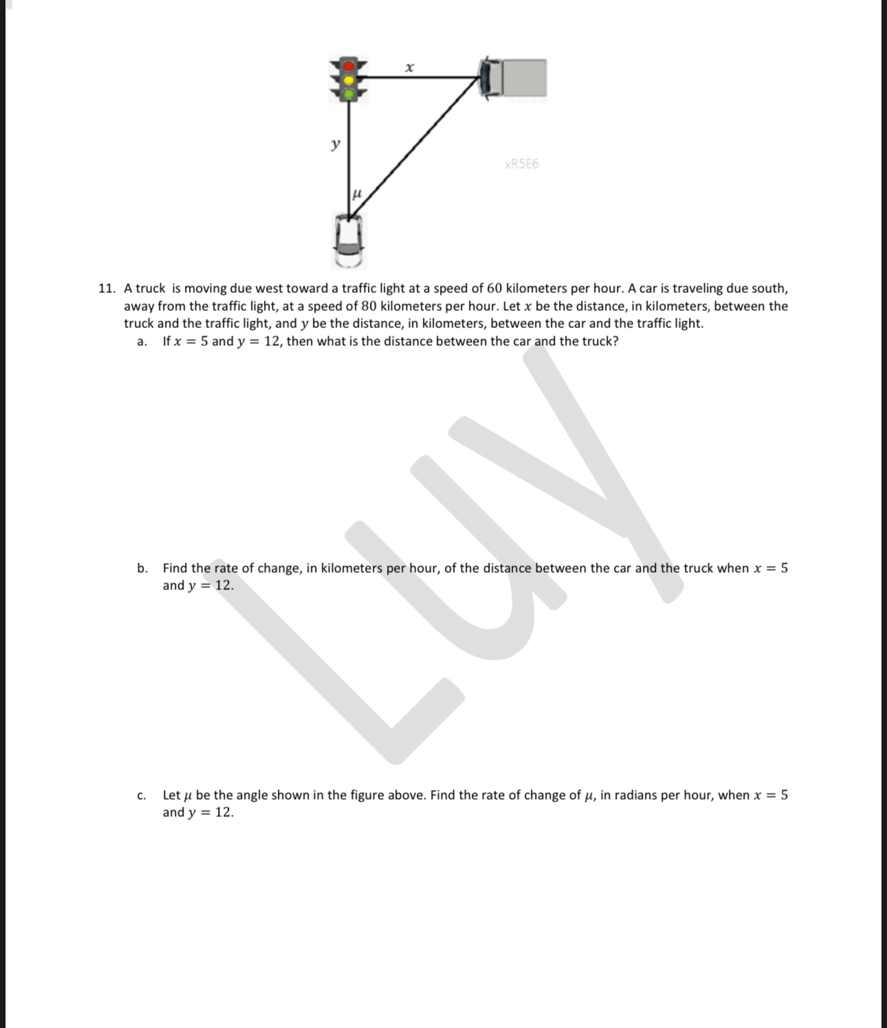 A truck is moving due west toward a traffic light