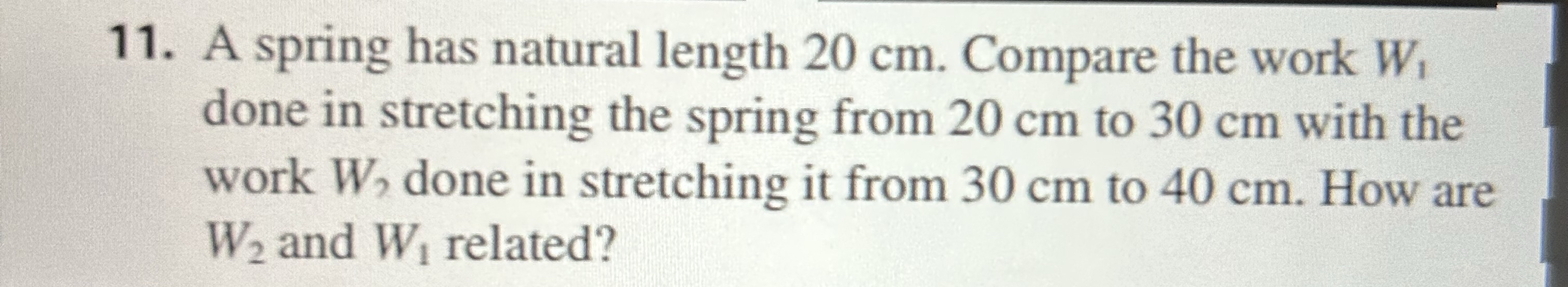 A spring has natural length 2 0 cm . Compare the