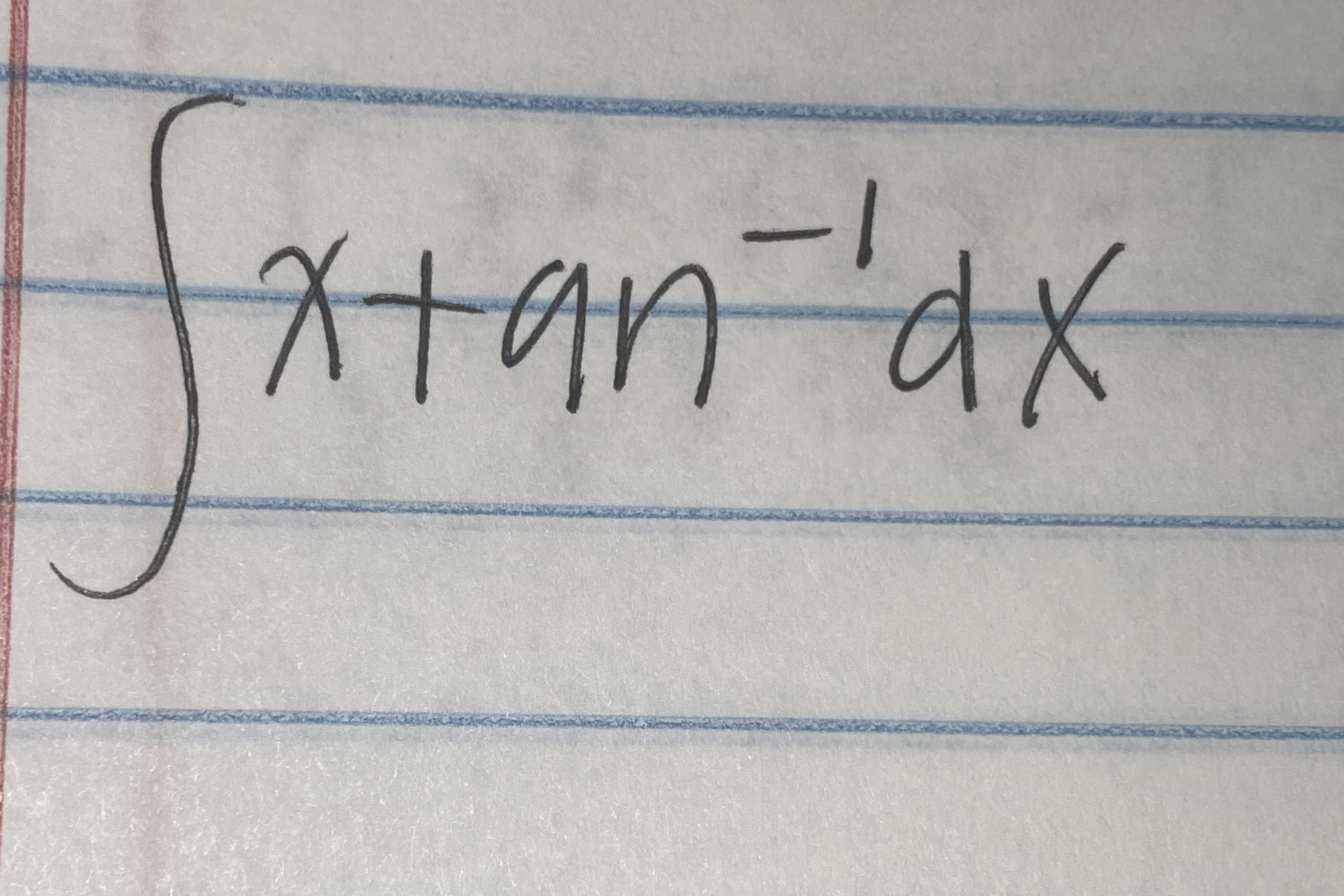 x t a n - 1 d x integrate