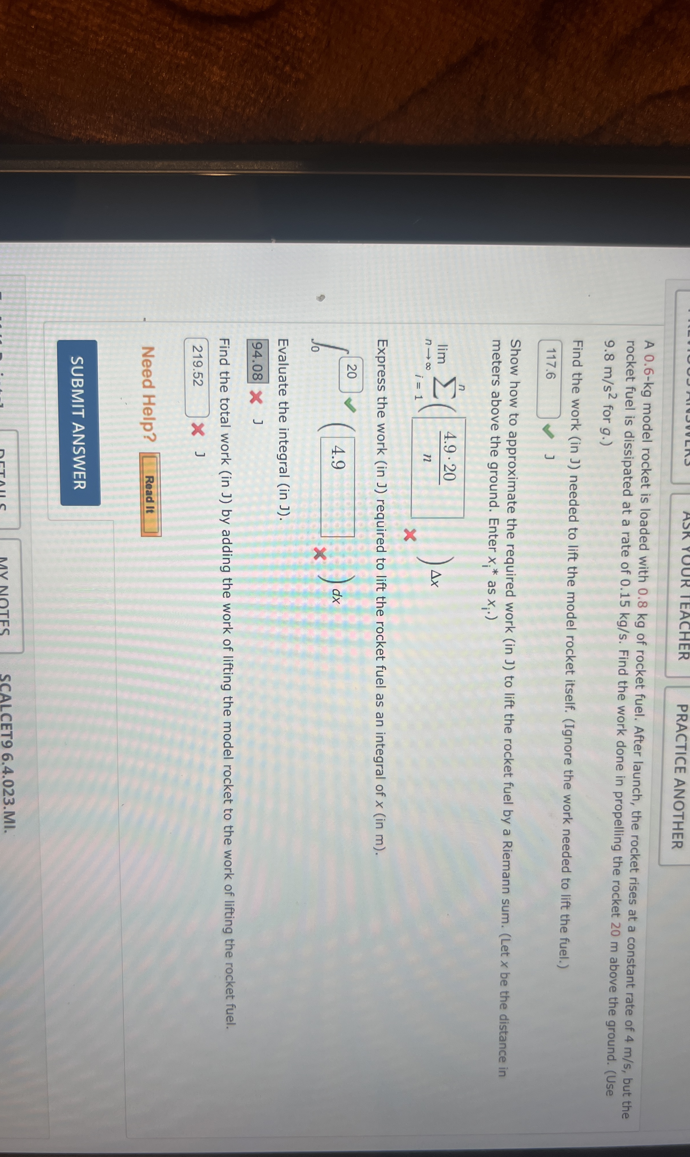 A 0 . 6 - k g model rocket is loaded with 0 . 8