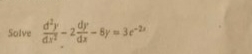 Solve d 2 y d x 2 - 2 d y d x - 8 y = 3 e - 2 x
