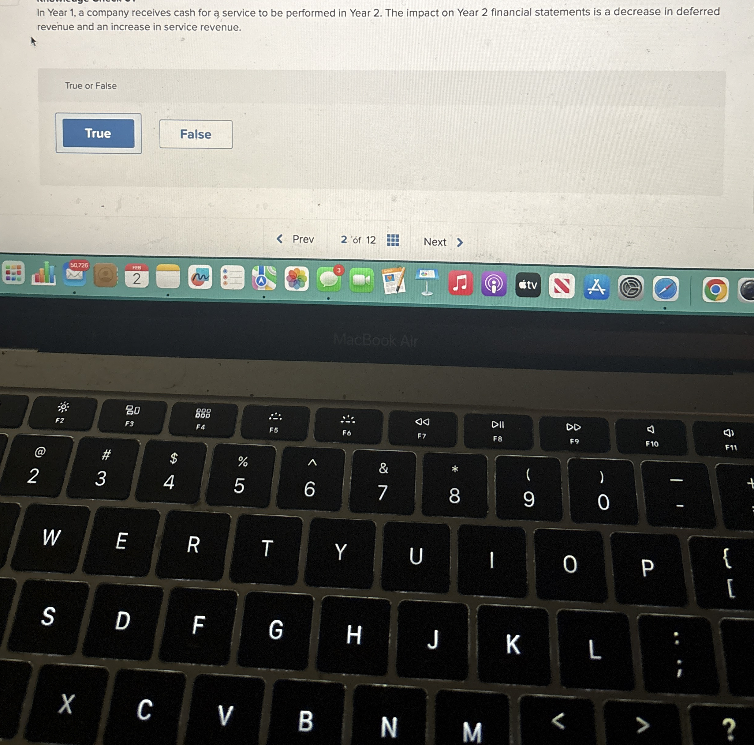 In Year 1 , a company receives cash for a service