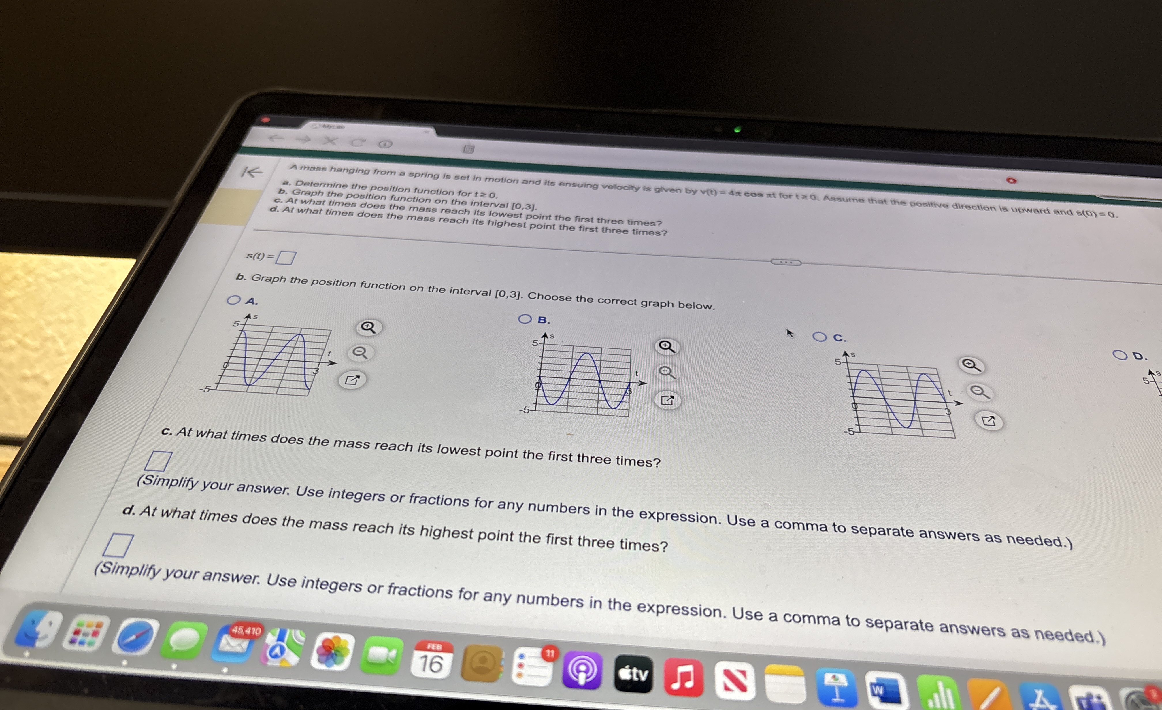 1 larr A mass hanging from a spring is set in