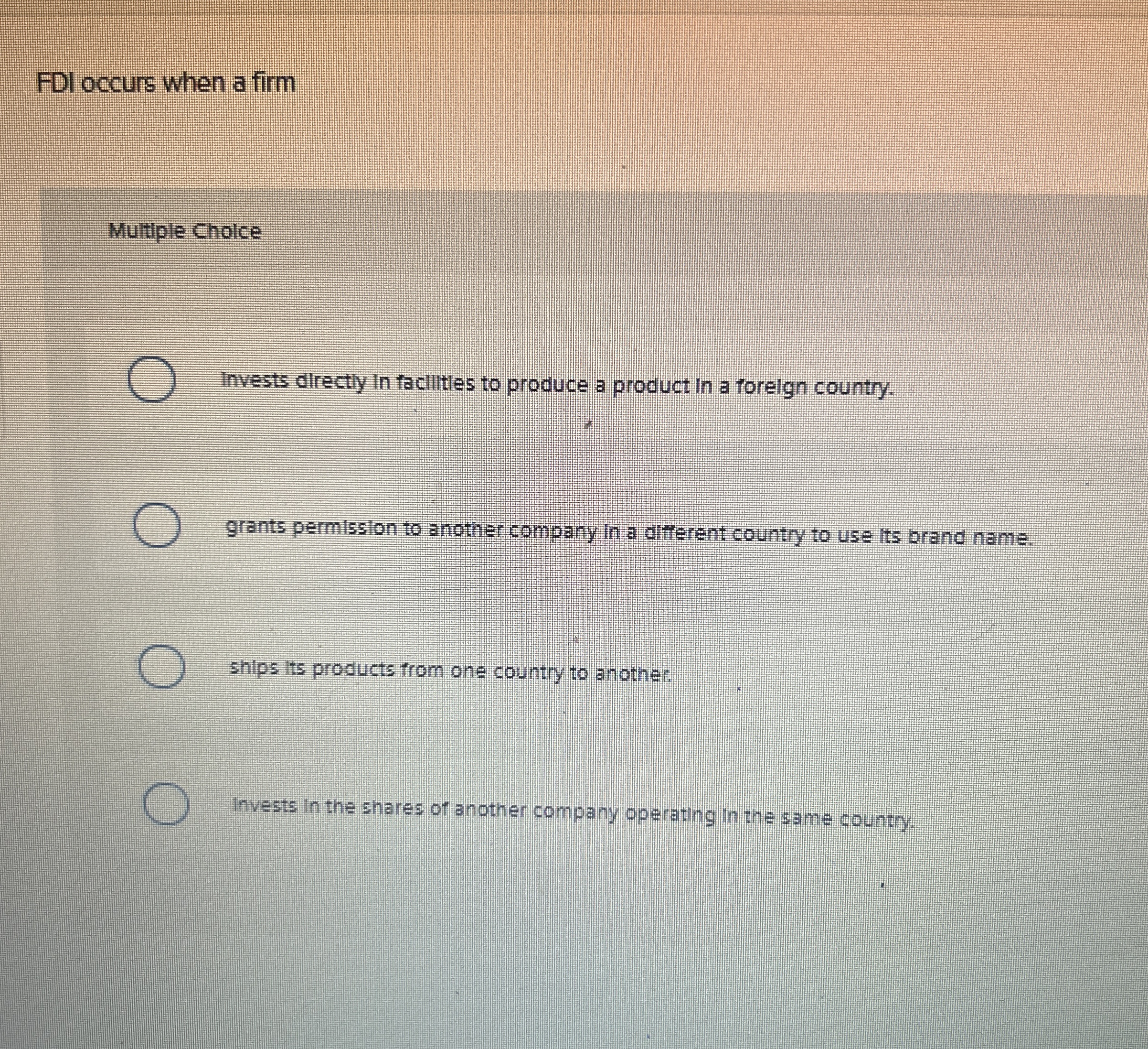 FDI occurs when a firm Multiple Cholce Invests