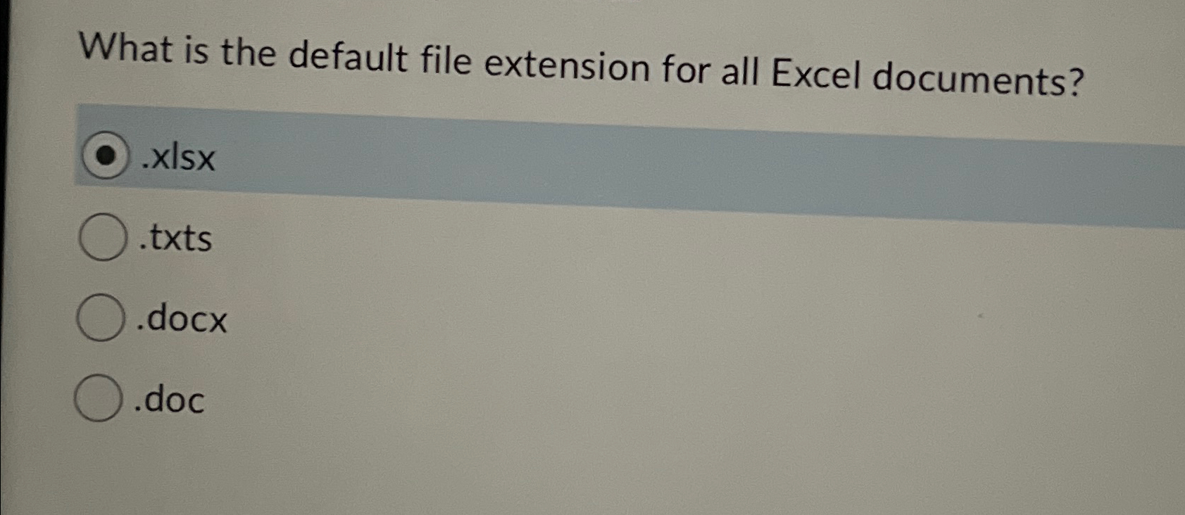 What is the default file extension for all Excel