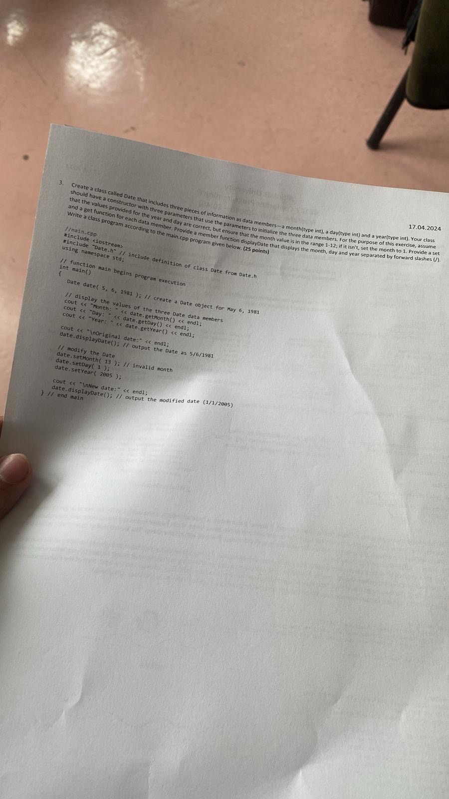 Create a class called Date that includes three