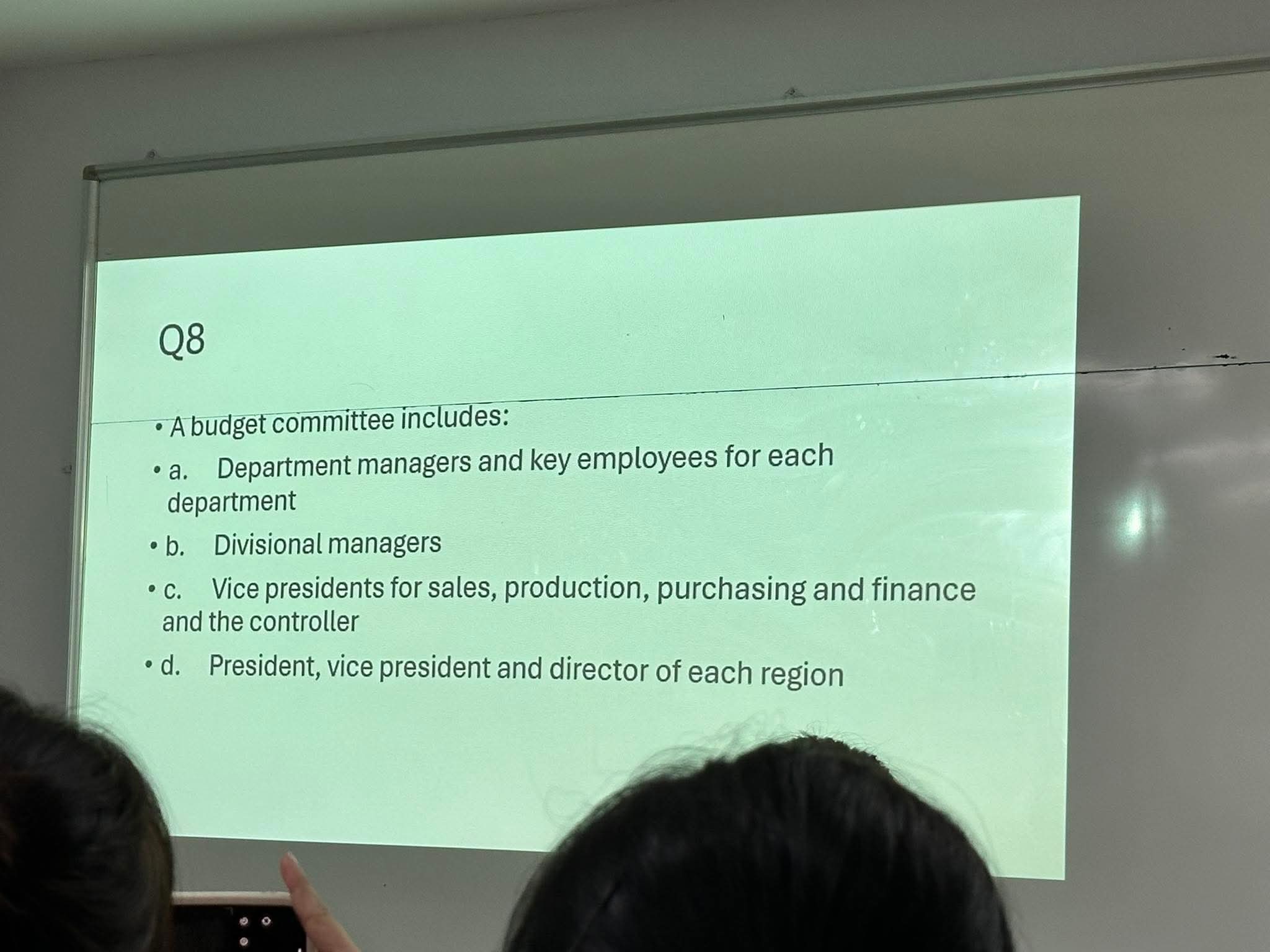 Q 8 - A budget committee includes: - a .