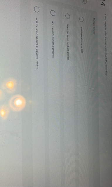 If two projects offer the same positive NPV ,