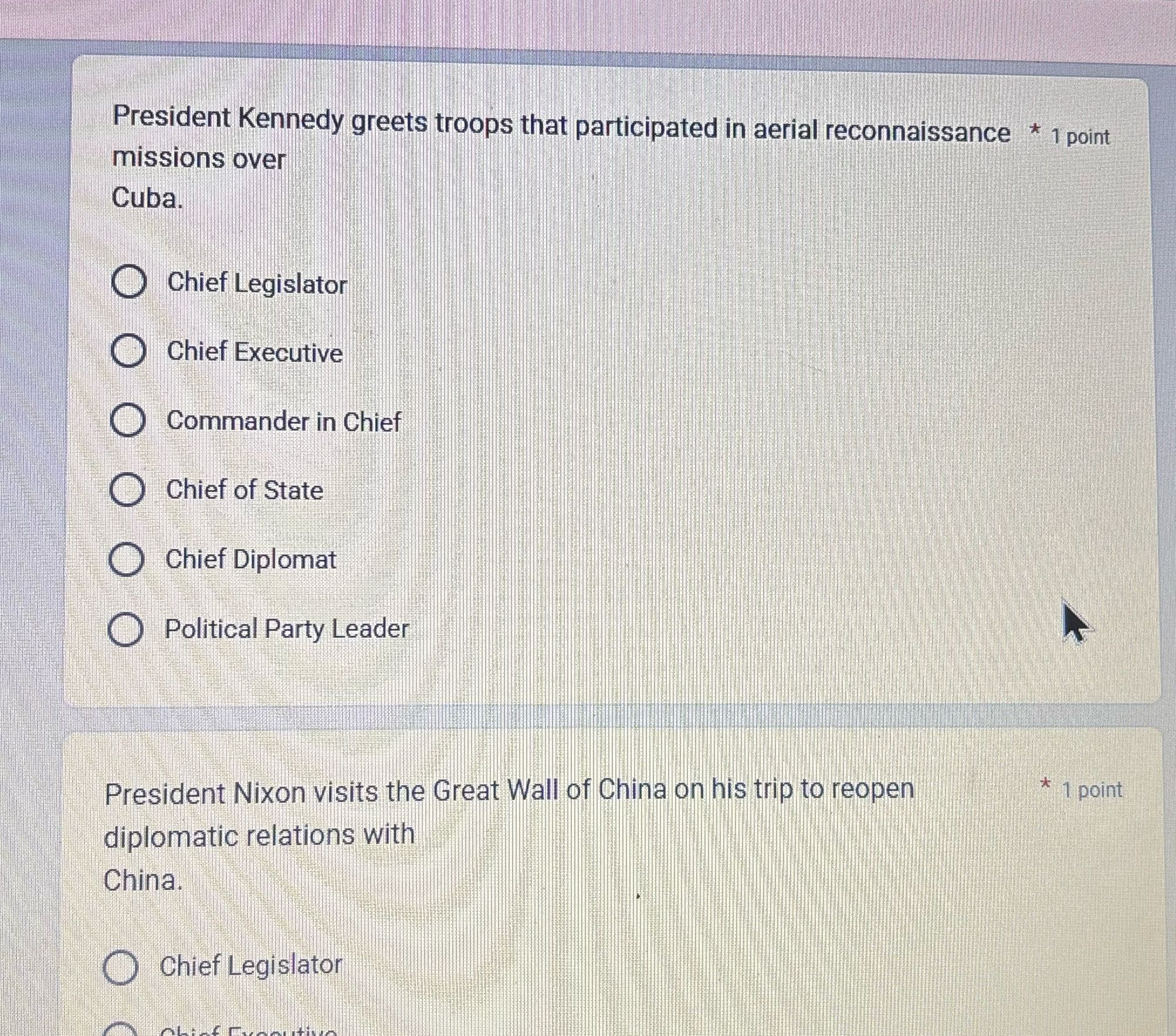 President Kennedy greets troops that participated