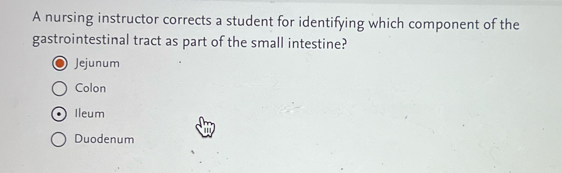 A nursing instructor corrects a student for