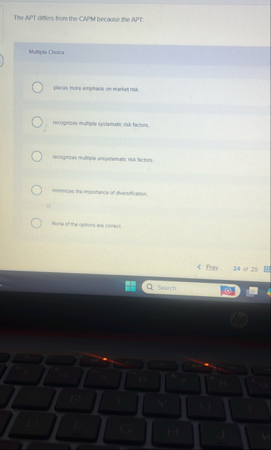 The APT differs from the CAPM because the APT: