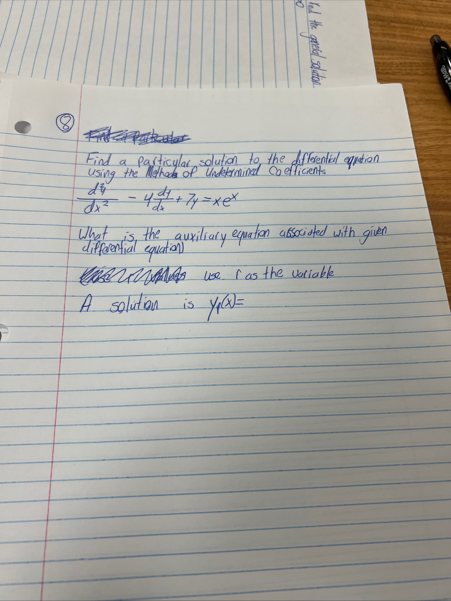 Find a particular solution to the differential