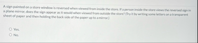 A sign painted on a store window is reversed when