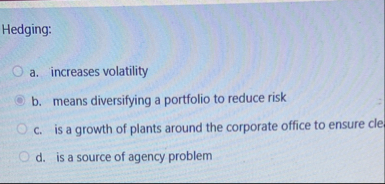 Hedging: a . increases volatility b . means