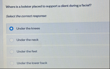 Where is a bolster placed to support a client