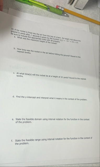 A toy rocket is fired into the air from the top