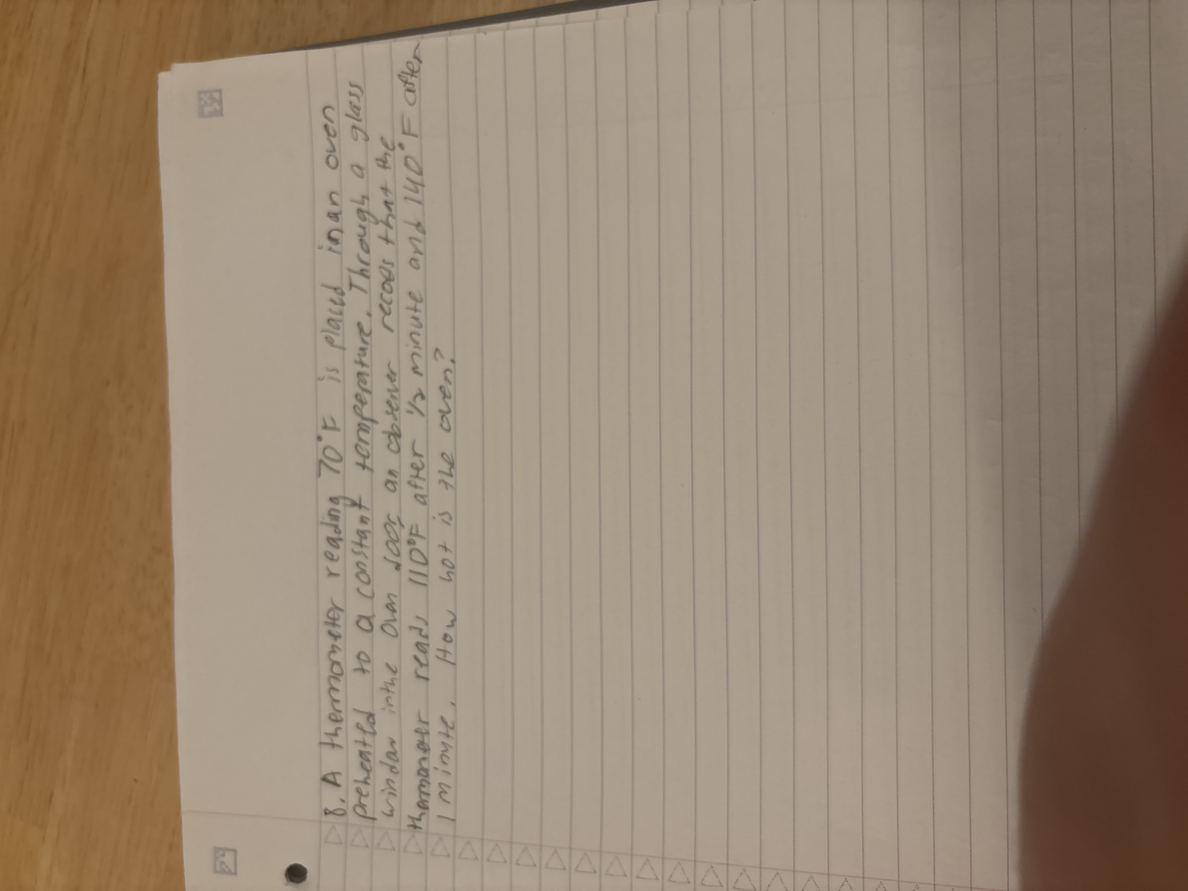 A thermometer reading 7 0 F i s placed i n a n