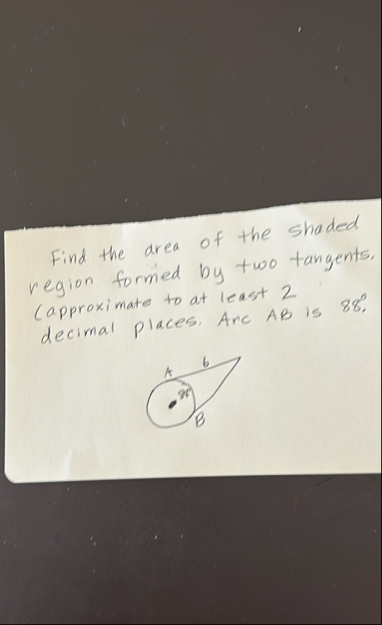 the area of the shaded Capproximate by two