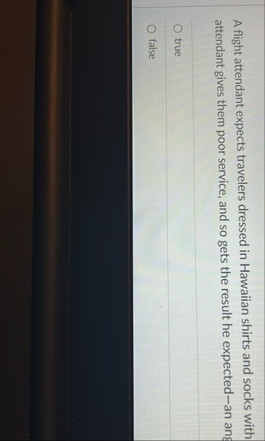 A flight attendant expects travelers dressed in