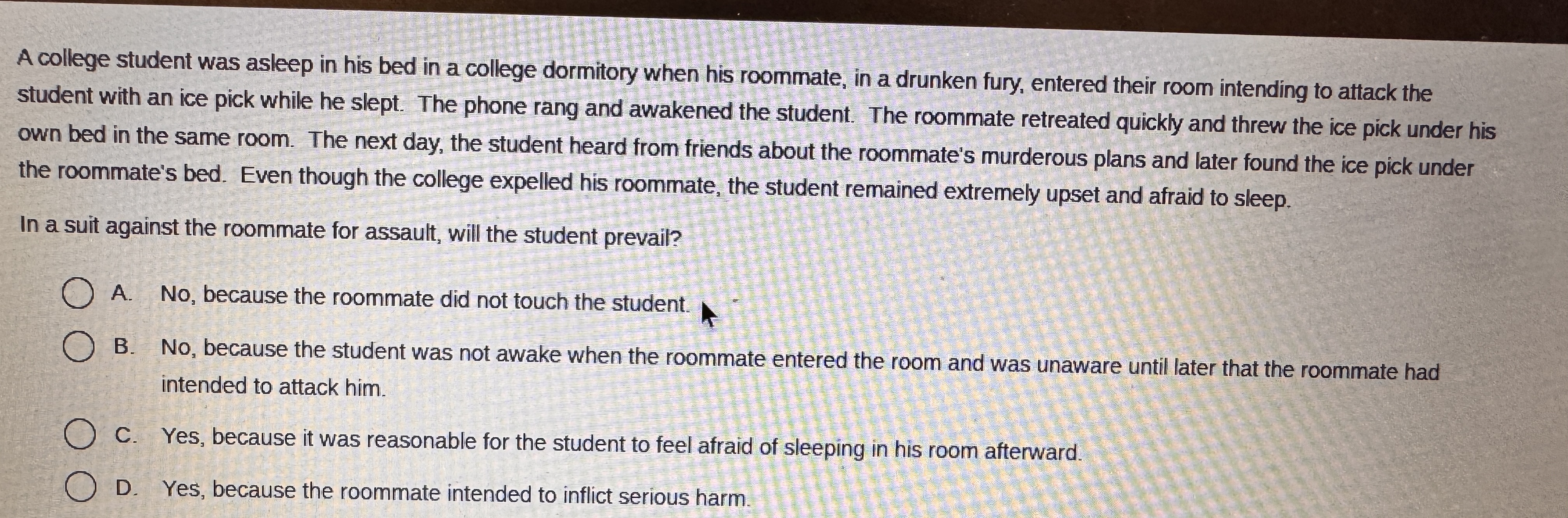 A college student was asleep in his bed in a