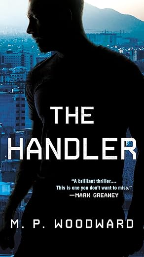 the handler 1st edition m p woodward 0593441656, 978-0593441657