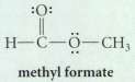 (a) Give the H-C=O bond angle in methyl formate.(b) One
