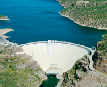 Water is stored in an artificial lake created by a