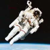 Astronauts in a spacecraft orbiting the Earth or out for