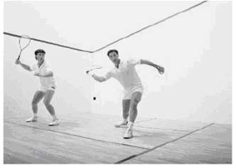 In a typical game of squash (Fig. 14-22), two people