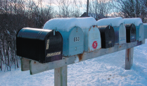 The snow-covered mailboxes raise a question: What explains why the