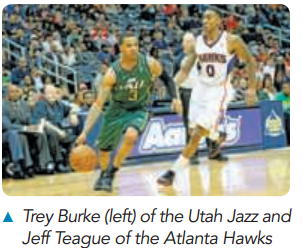 A Trey Burke (left) of the Utah Jazz and Jeff Teague of the Atlanta Hawks 